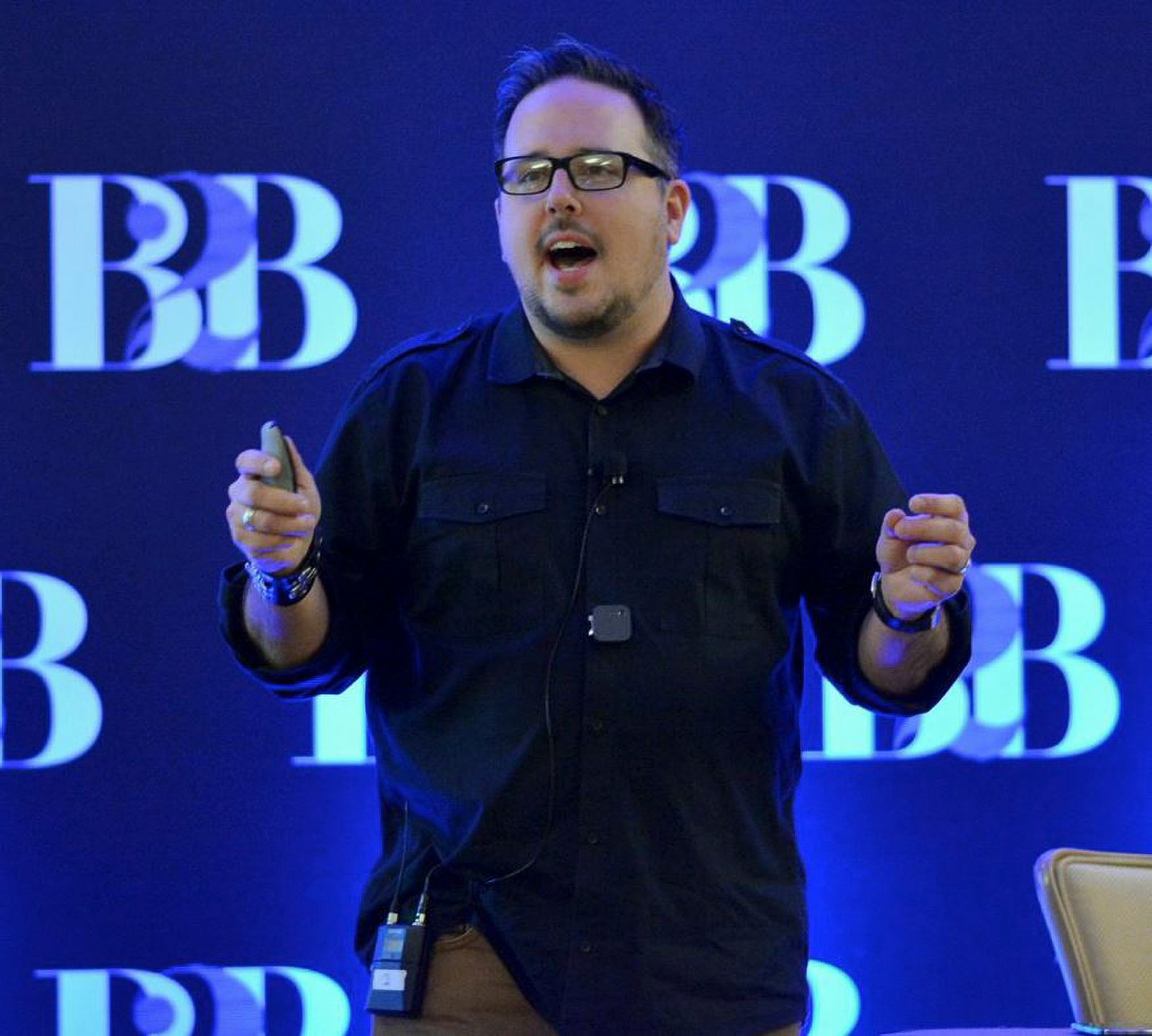 Jason Miller speaking at a B2B marketing conference